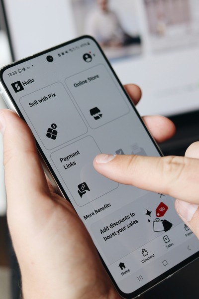 Smartphone showing online payment interface with card and checkmark